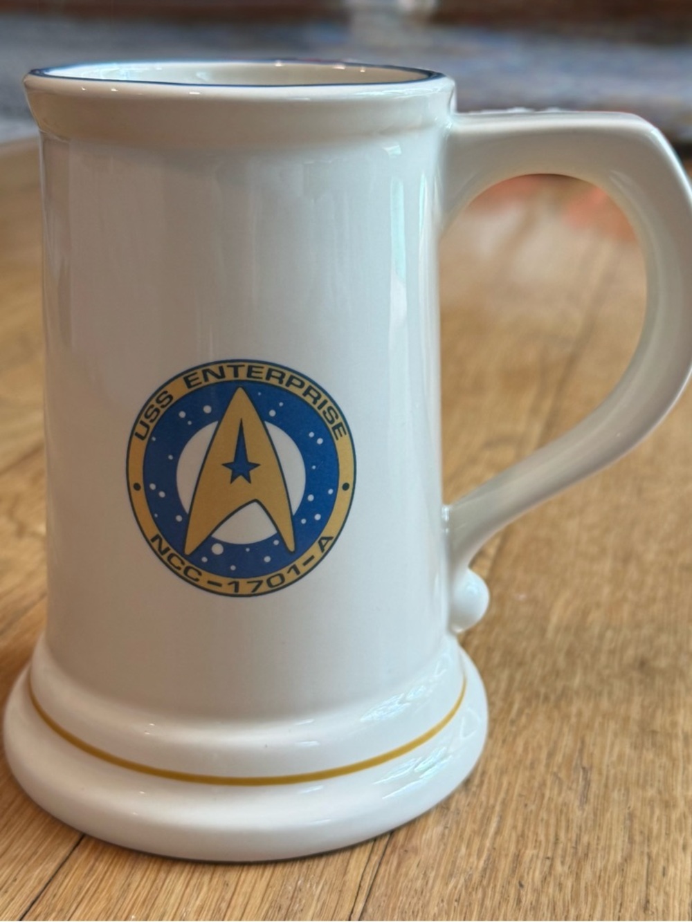 Pfaltzgraff White Ceramic Mug with Blue and Gold Emblem